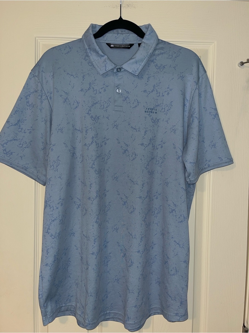 TravisMathew Warmer Tides Scoop Polo Shirt - Arona